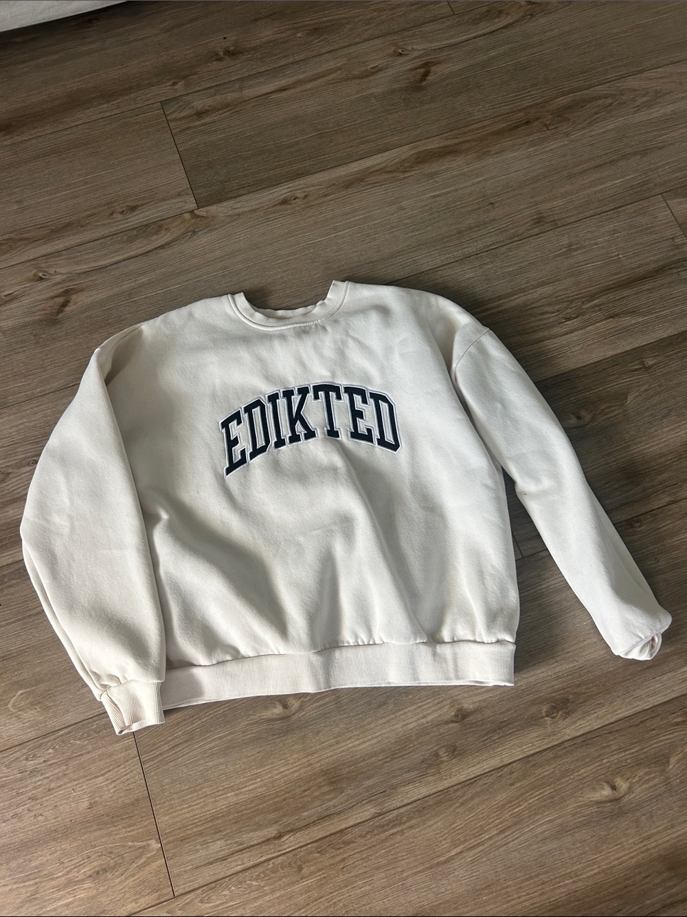 Edikted White Sweatshirt with Navy Arch Logo